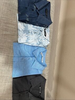 4 Travis Mathew polo good condition